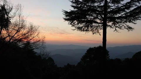 Sunset view as seen from a himalayan mountaintop in Binsar (Uttarakhand, India) Video stock 297561413