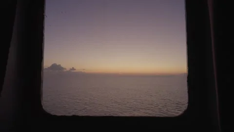 Sunset view from the ship's window. Sea voyage Stock Footage 293050816