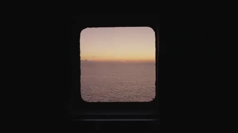 Sunset view from the ship's window. Sea voyage Stock Footage 293353476