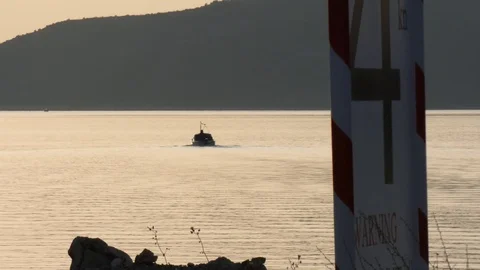 Sunset view - Single Boat- Trogir, Croatia - Tilt Shot Video stock 85802937