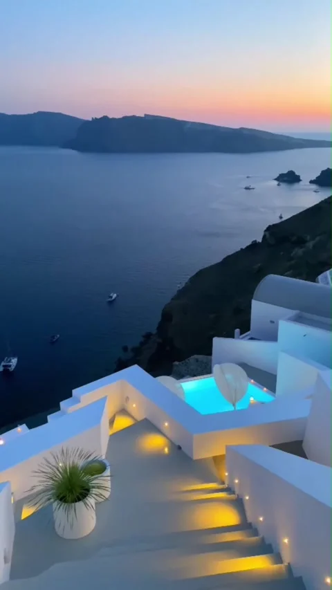 Sunset view from steps in Santorini over the sea and volcano. Stock Footage 335079622