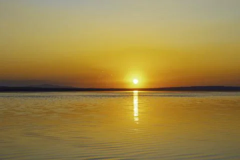 Sunset view. Sunset over the lake. Tranquilty background photo Stock Photos