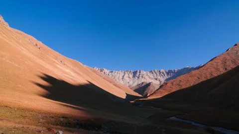Sunset view to Tash-Rabat river and valley in Naryn province, Kyrgyzstan Stock Photos