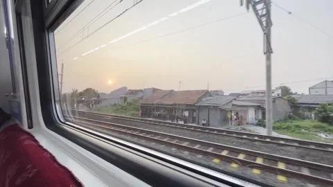 Sunset View Through Moving Train Window During Railway Journey Stock Footage 339326760