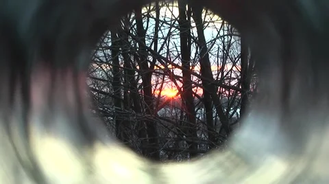 Sunset. view through the roll of a photographic film Stock Footage 1079422