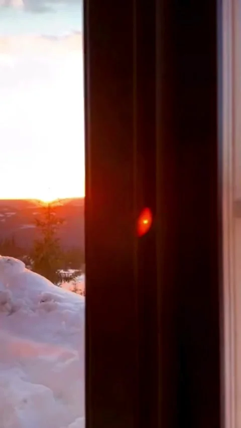 Sunset View Through Window with Snow Landscape Stock Footage 331743101