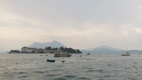 Sunset View On Tourist Boat Sailing At Lake Maggiore. Italy. Wide Shot. Video stock 123701102