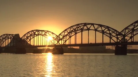 Sunset view of train bridge in Riga from the boat Video stock 85022019