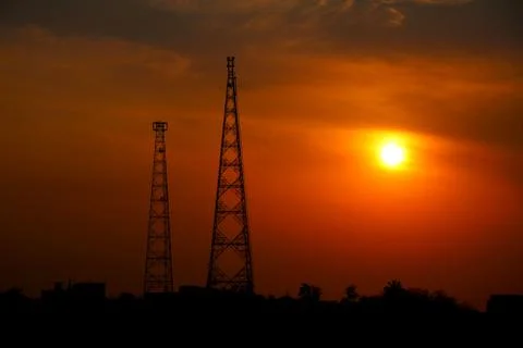 Sunset view with two telecommunication tower Stock Photos