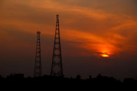 Sunset view with two telecommunication tower Stock Photos