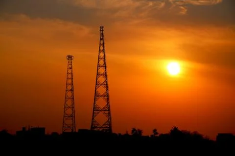 Sunset view with two telecommunication tower Stock Photos