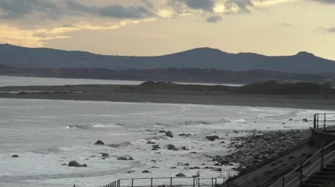 Sunset view of waves and mountains Stock Footage 49640209