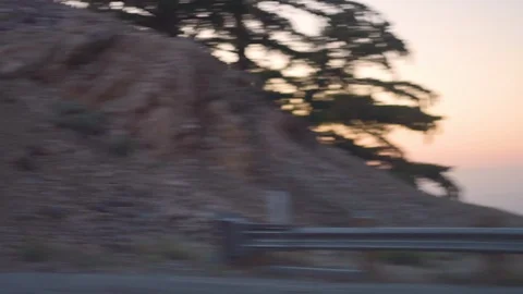 Sunset view while driving in the mountains Stock Footage 115394326