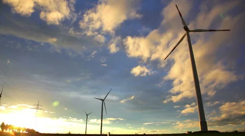 Sunset view at wind turbines under evening sun Stock Footage 54915547