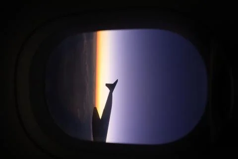 Sunset view from the window of an aircraft Stock Photos
