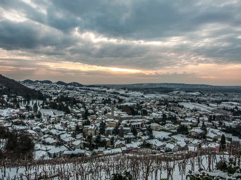 Sunset view of a winter landscape in a small town. Timelapse Stock Footage 85056937