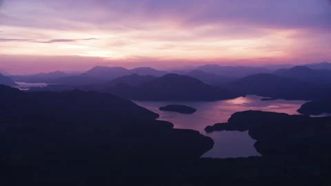 Sunset views over tranquil lakes in the mountains Stock Footage 320266986
