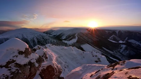 Sunset w mountain landscape, snow covered hills, winter landscape, national park Видео 167375224