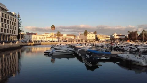 Sunset walk at Faro Marina, Algarve, Portugal Stock Footage 166375757