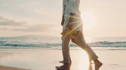 Sunset Walk on a Luxury Beach. Happy Retired Couple on Tropical Vacation. Video stock 57715237