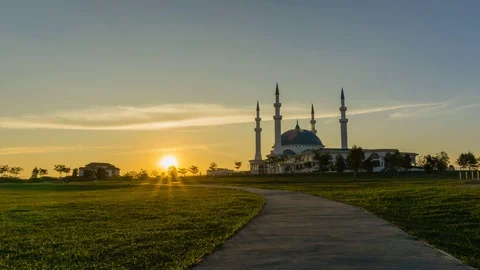Sunset at walking park with Mosque as background Stockbeeldmateriaal 77335219