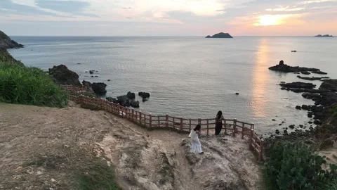 Sunset walkway at Eo Gio cliffs, Quy Nhon, Vietnam coast Stock Footage 337890147