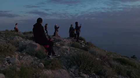 Sunset watchers at Mount Srd panorama point, Dubrovnik, Croatia, 4k Video stock 274457423