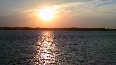 Sunset on the water-JPEG 75 NTSC Stock Footage 961789