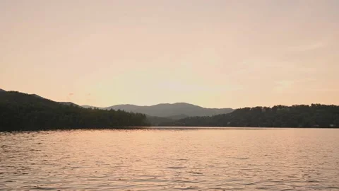 Sunset on the Water In the Mountains 2 Stock Footage 137866782