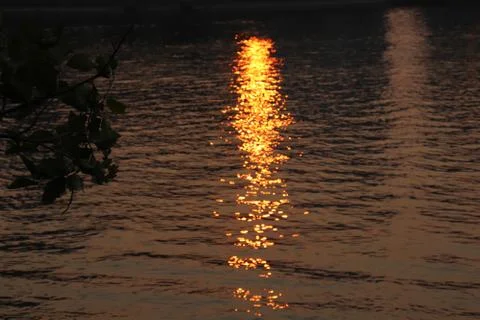 Sunset on water Stock Photos