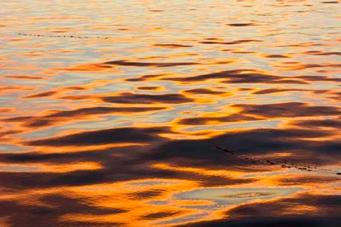 Sunset water reflection Stock Photos