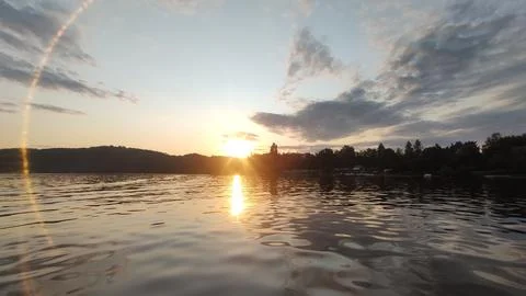Sunset from the water surface Stock-Fotos