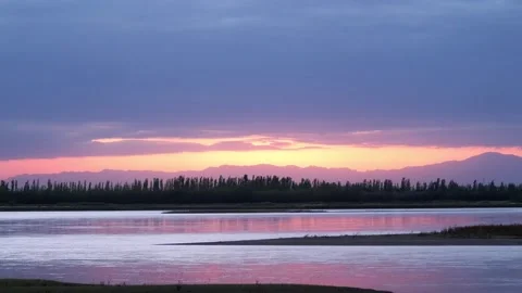 Sunset - water surface - river - calm flow Stock Footage 259543458