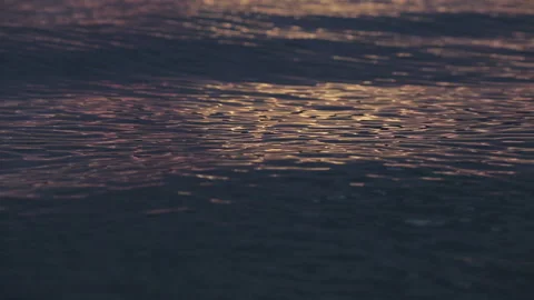 Sunset water waves surface reflection Stock Footage 94106494