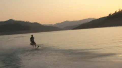 Sunset waterskiier Stock Footage 558825