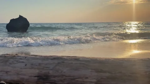 Sunset wave and coastal rock at Agios Gordios beach on Corfu Island, Greece. The Video stock 344426657