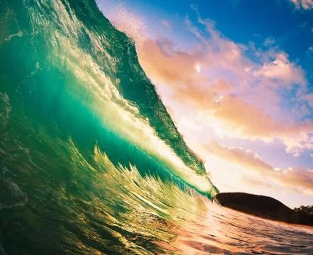 Sunset wave Stock Photos