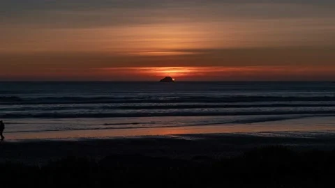 Sunset with Waves at the Beach Timelapse Stock Footage 169061591