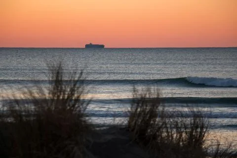 Sunset waves breaking at Ocean Beach, San Francisco, California Stock Photos