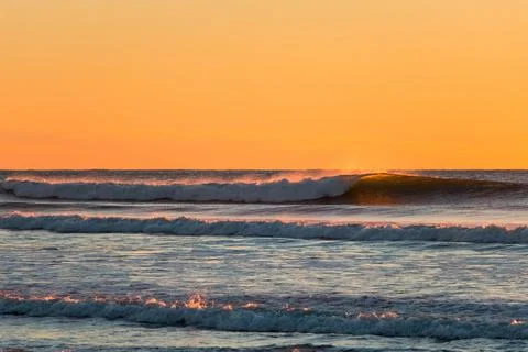 Sunset waves breaking at Ocean Beach, San Francisco, California Stock Photos