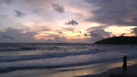 Sunset waves kid Stock Footage 114486646