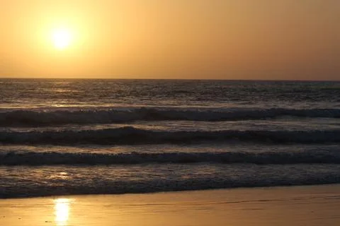 Sunset waves Stock Photos