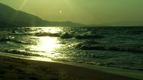 Sunset with waves rolling in Stock Footage 285773