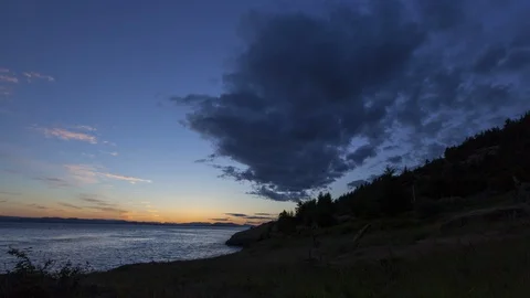 Sunset on West Side of San Juan Island Wa_motion with clouds 4k Stock Footage 100567508