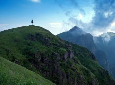 Sunset when the mountains Stock Photos