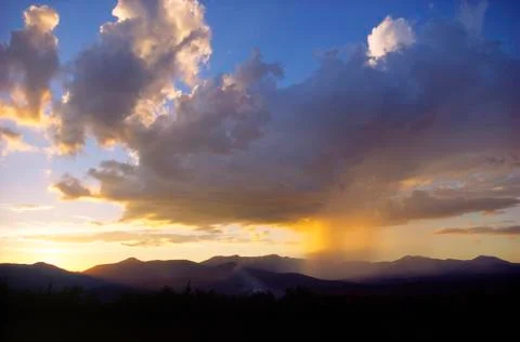 Sunset while raining over mt. mansfield, stowe, vermont Stock Photos