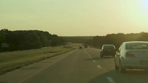 Sunset whilst driving on the motorway  Stock Footage 79851483