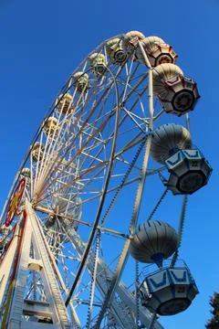 Sunset Whimsy: Ferris Wheel Magic in the Amusement Park Stock Photos