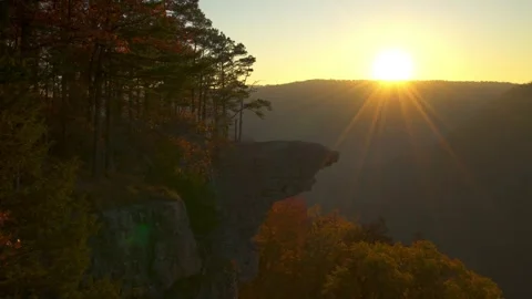 Sunset Whitaker Point Mountain Ledge Pan to Sunset Sun Flare Hand Held Stock Footage 256052588