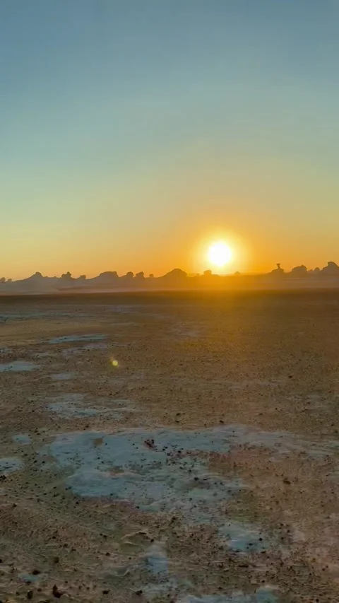 Sunset in the White Desert, Egypt, driving a car Stock-Footage 313541649